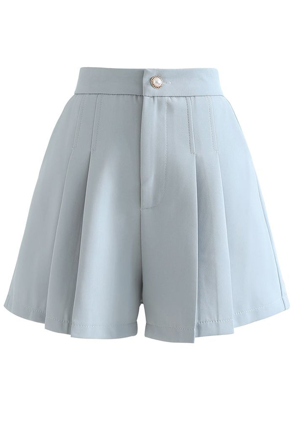 Herma- Plisserade shorts med sidoficka i blått