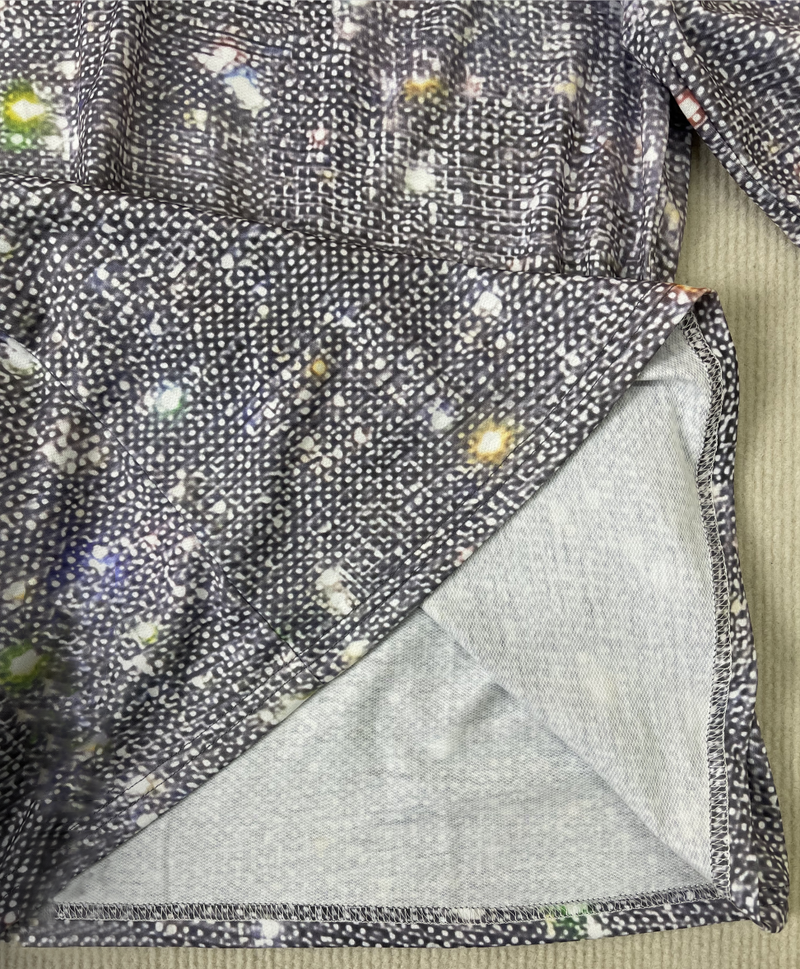 Elvira - Långärmad tröja med V-ringning i silvermetallic och discoflittermönster
