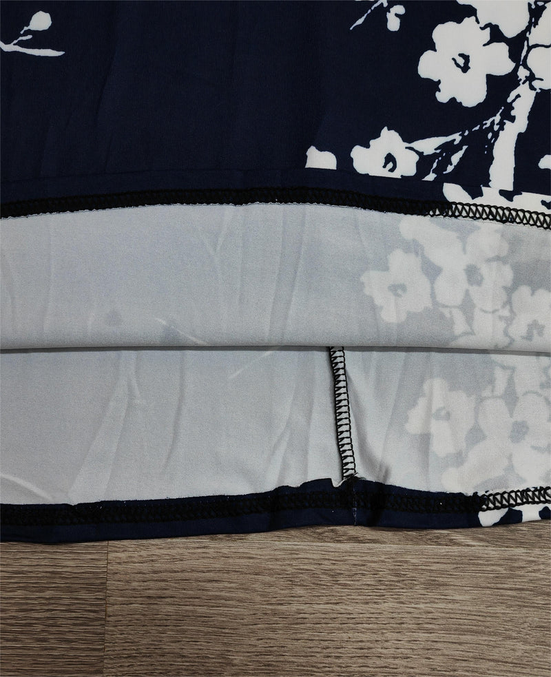 Thyra - Marinblå ärmlös maxiklänning med blommigt tryck